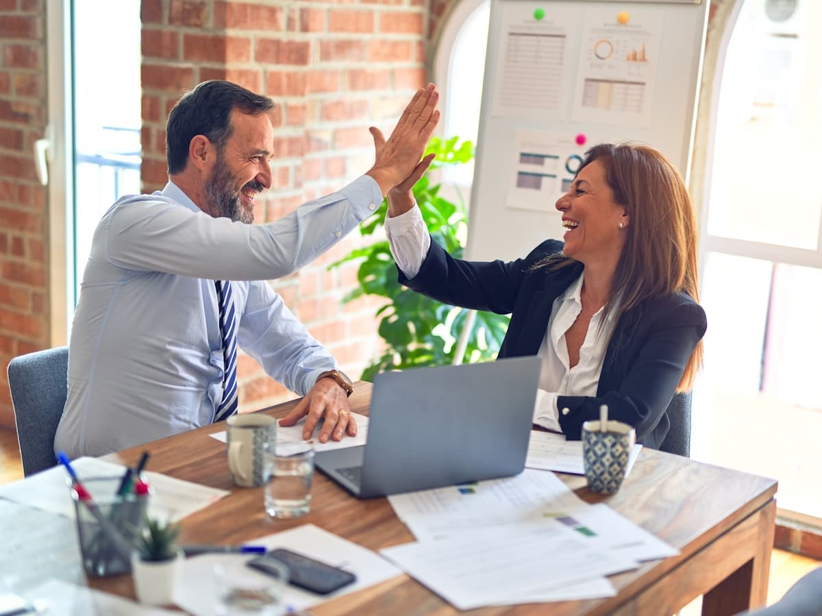 An Integrity Cost Consulting advisor meeting with a client